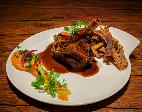 Souris d'agneau confite au miel et au muscat de Rivesaltes.